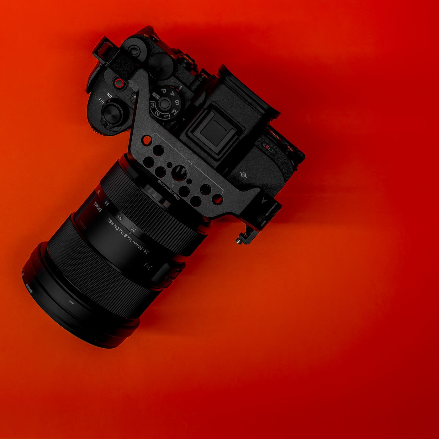 Professional camera on a red background