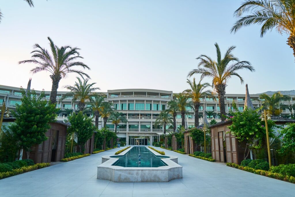 Modern resort with a swimming pool at dusk
