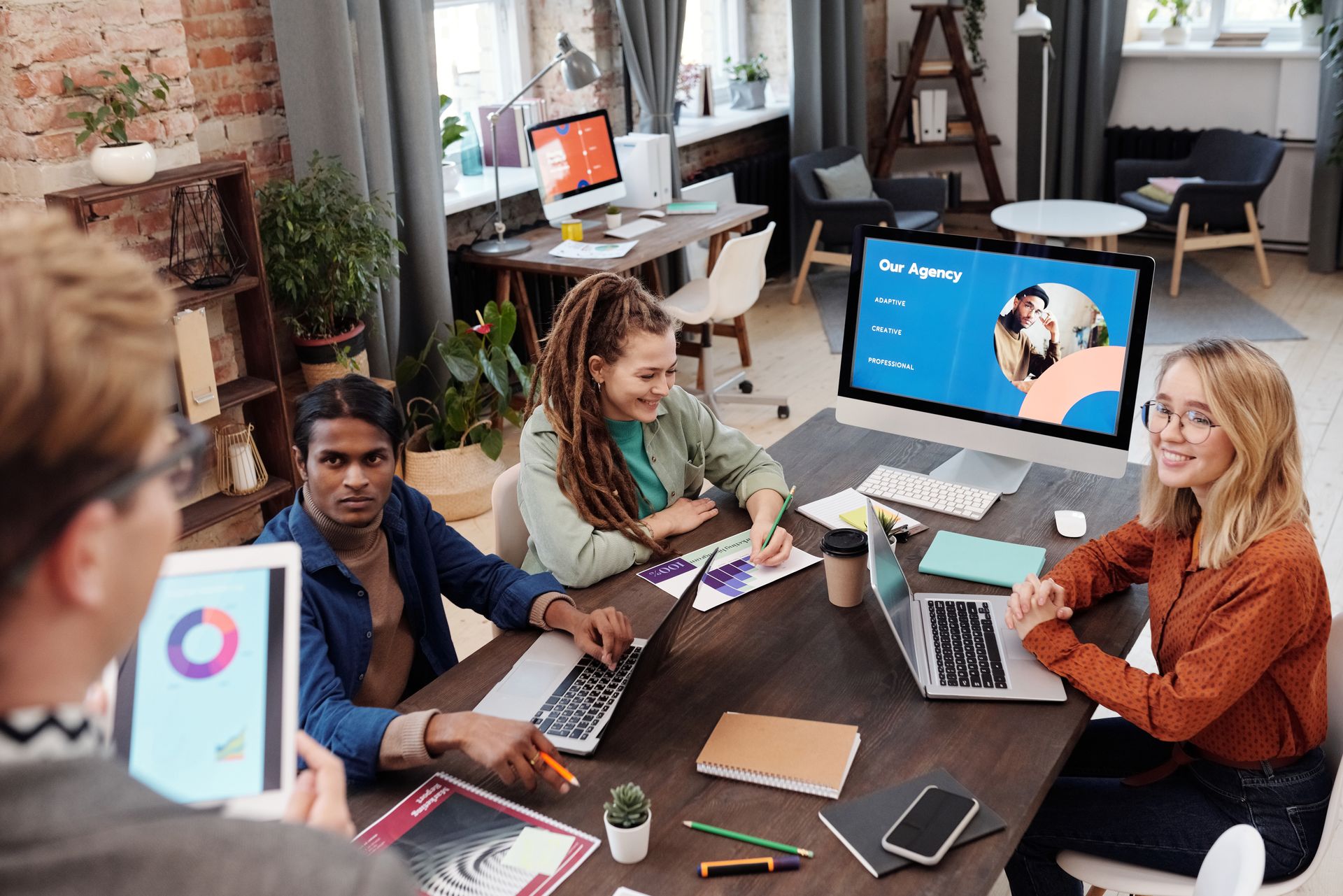 Team collaborating on a project in a modern office