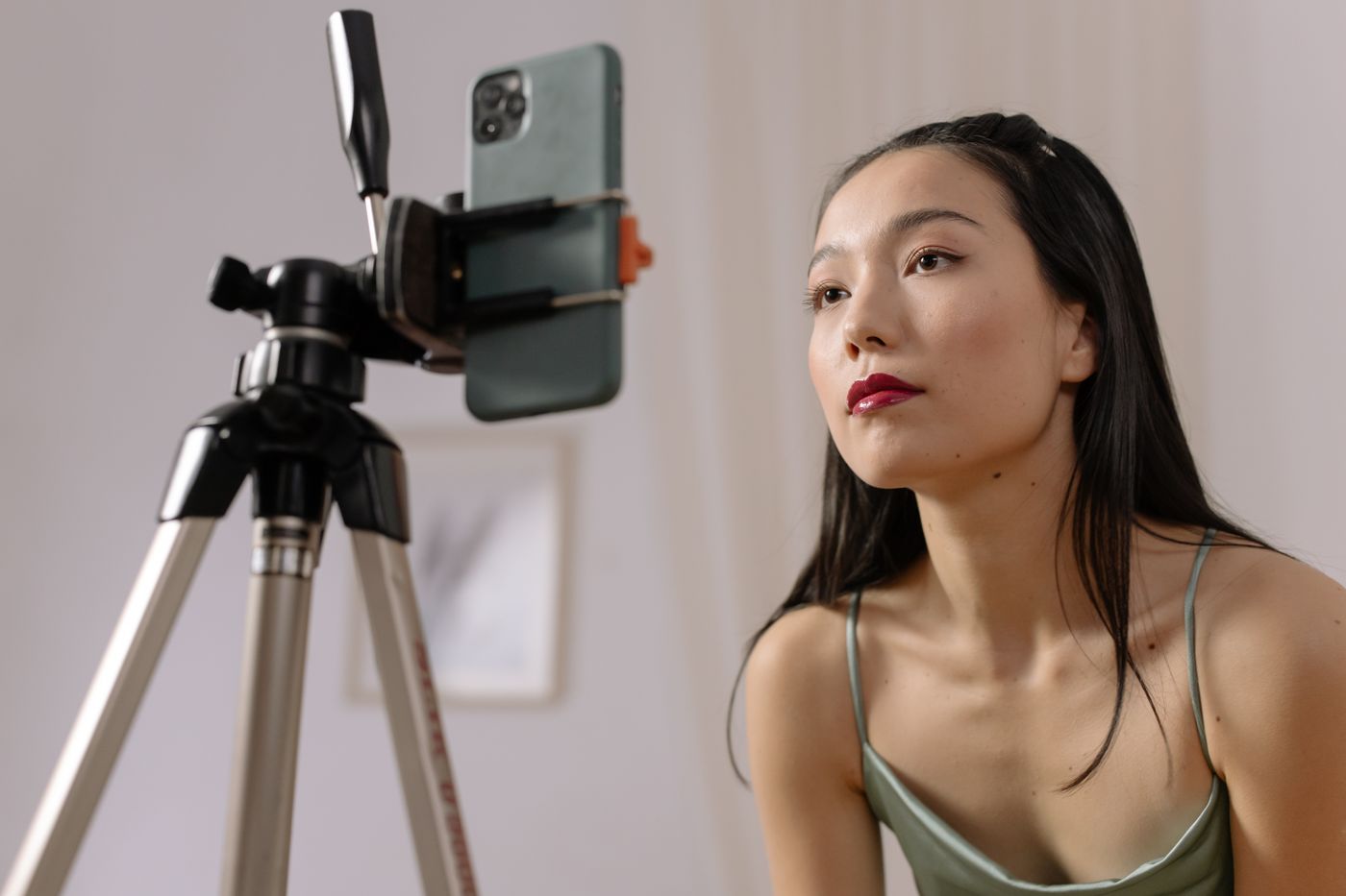 Woman recording content on a smartphone