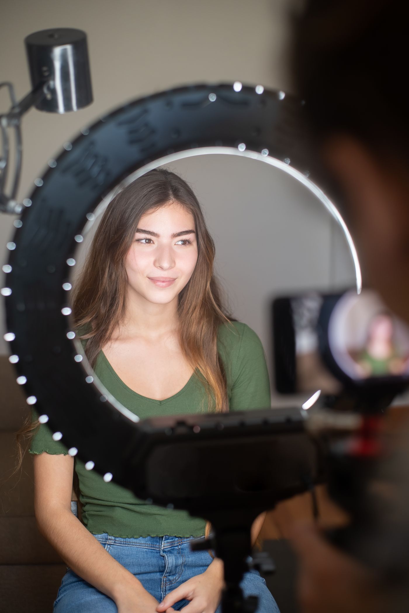 Creator streaming with a ring light