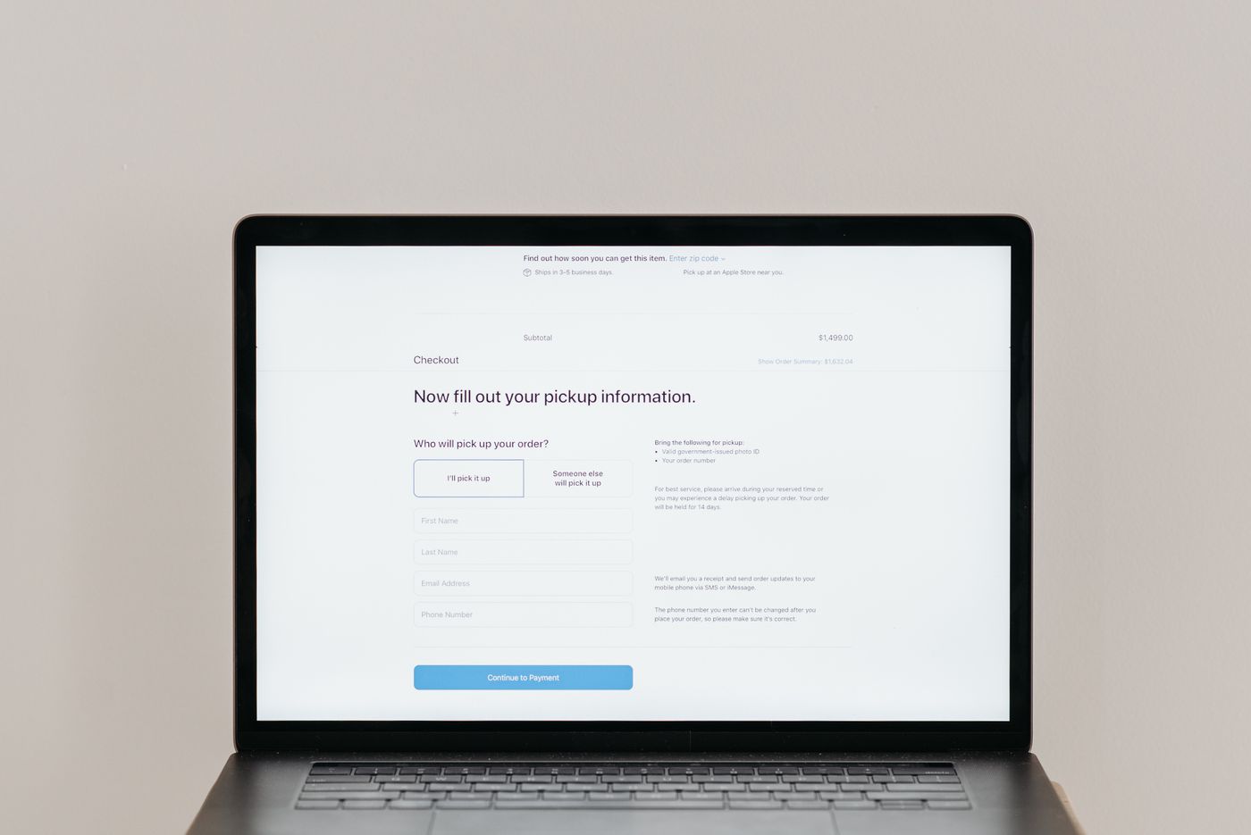 Laptop displaying a website form